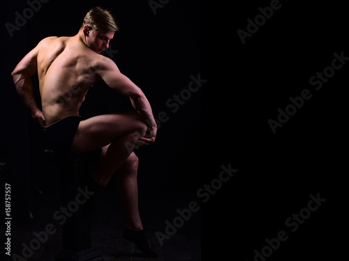 athlete, muscular man with bare torso, six pack in underwear