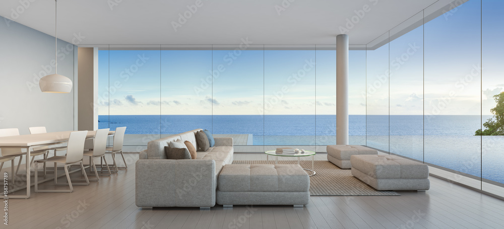 Dining and living room of luxury beach house with sea view swimming ...