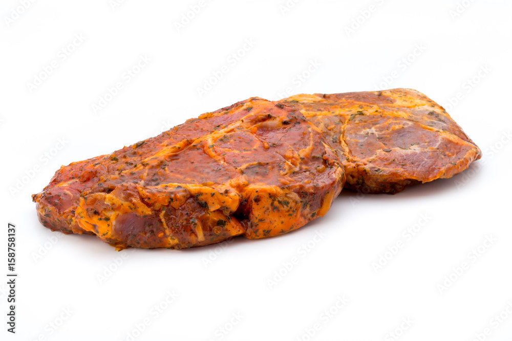 Pork chop, marinated. Isolated on the white background.