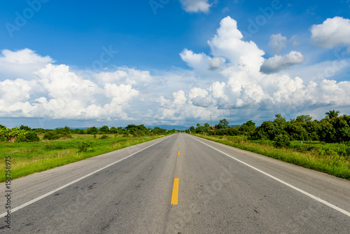 country road with blue sky