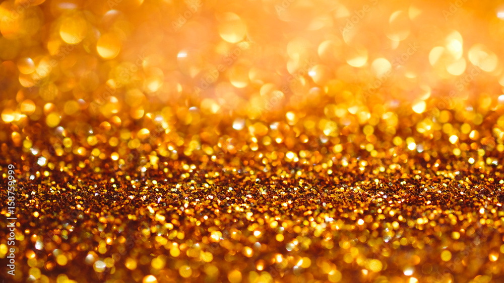 Gold light bokeh texture or glitter lights festive gold background. Christmas abstract template Gold light bokeh texture or glitter lights festive gold background. Christmas abstract template