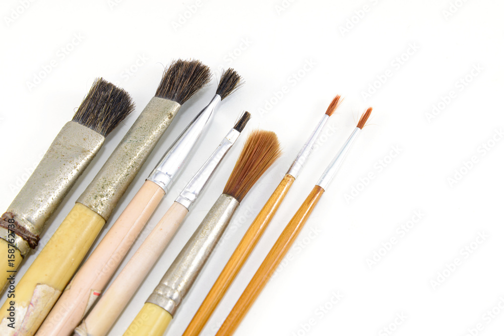 Collection of old paintbrush of different size and form Collection of old paintbrush of different size and form