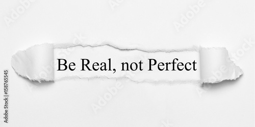 Be Real, not Perfect on white torn paper