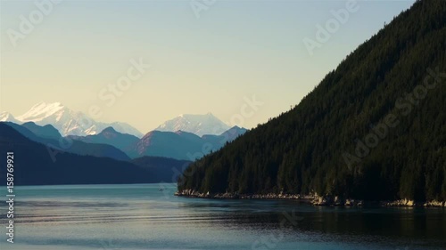Fishing Boat Along Alaskan Mountains - Dramatic Camera Move