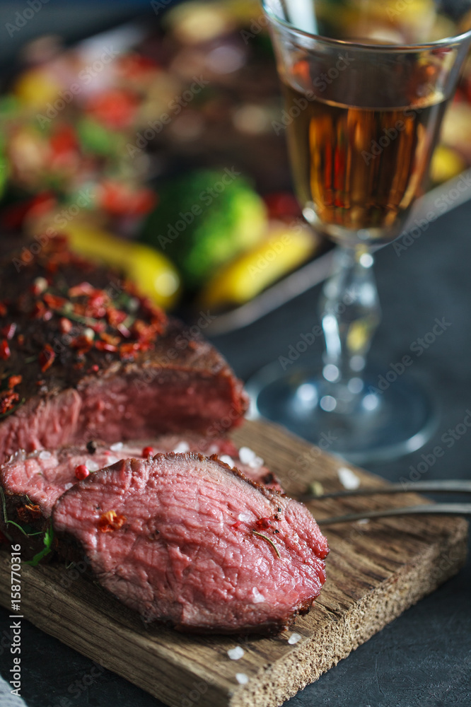 Pepper beef steak with vegetables on background Pepper beef steak with vegetables on background