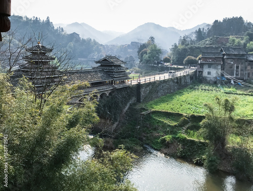 covered Chengyang Wind and Rain Bridge in evening