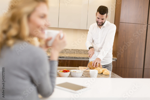 Man preparing a meal while ...
