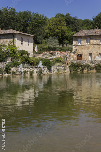 Bagno Vignoni medieval town with its square with hot spring thermal water, in Tuscany, Italy
