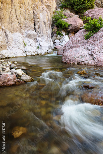 river flowing through a canyon in the desert 