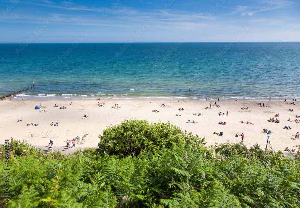 british seaside - summer holiday destination - top view of people on the beach in Bournemouth, Dorset, UK british seaside - summer holiday destination - top view of people on the beach in Bournemouth, Dorset, UK