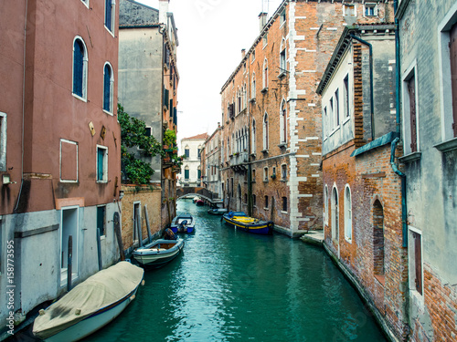 Canal with boats in venice