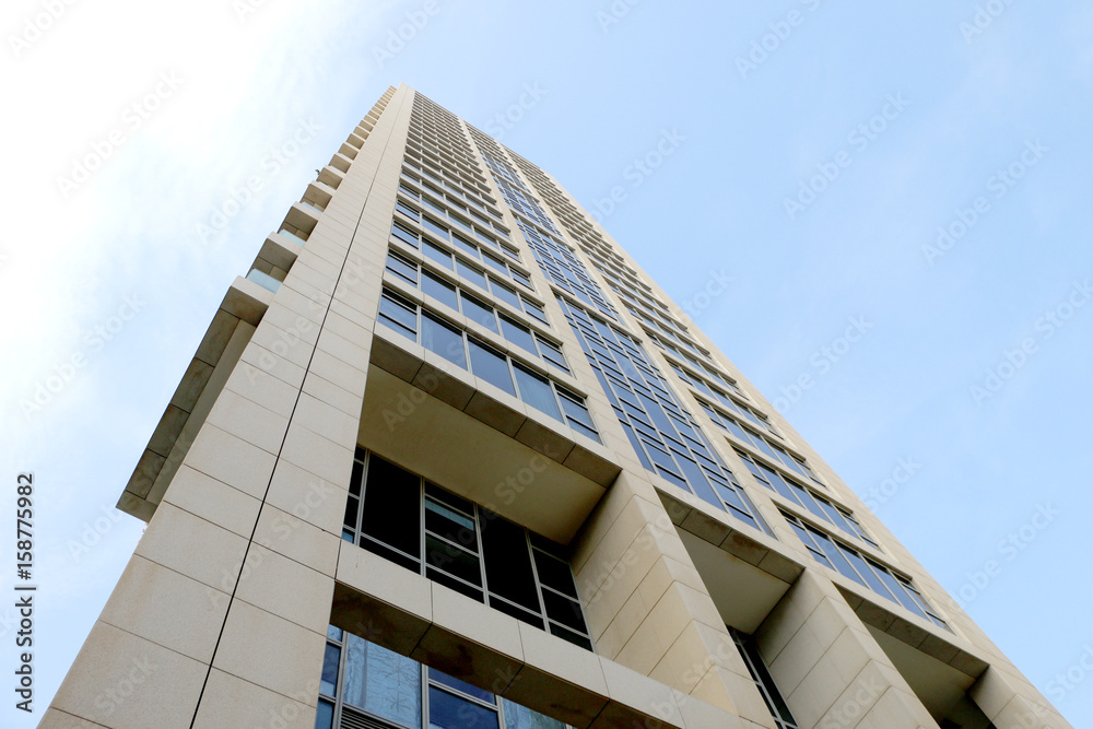High building on a background of pure blue sky High building on a background of pure blue sky