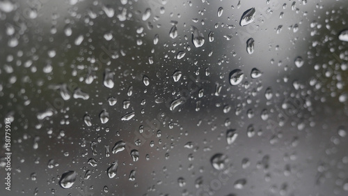Rain falling on glass during rain storm
