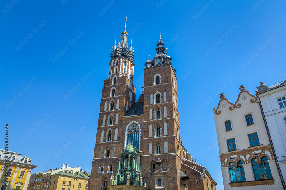 Amazing view with Saint Mary´s Church in the Rynek Glowny ,Market Main Square in Krakov, Poland, Europe