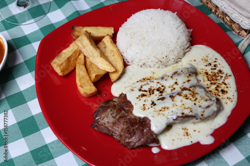 Italian dinner with breads, water and wine, table tidy