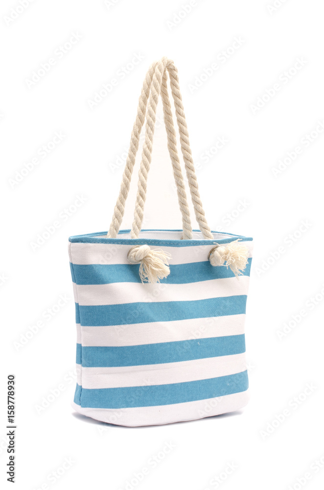 Beach striped handbag isolated on white Beach striped handbag isolated on white