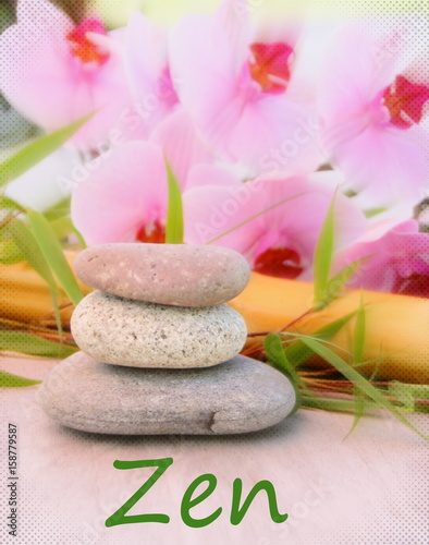 zen sur pile de galets et bambou ,orchidée rose