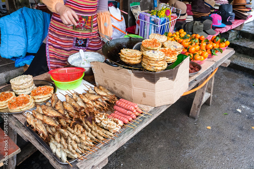 cook fried pies in street market in XingPing town