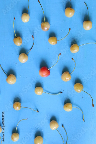 Cherry on a blue table