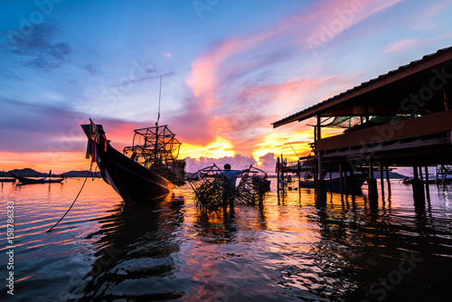 Fishing boats and fishing village sunset