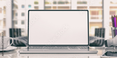 Laptop on an office desk. 3d illustration
