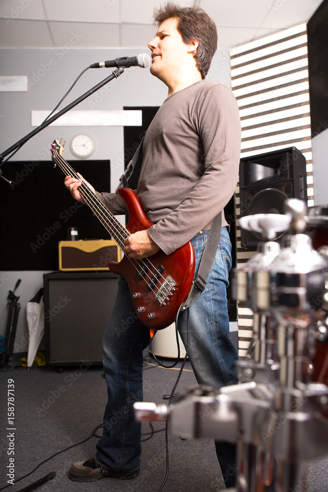 Fototapeta premium Rock musician playing bass