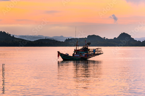 Floating fishing boat in the sea © sittitap