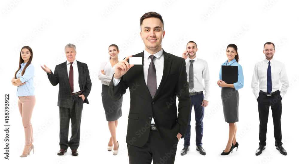 Young man holding blank business card and group of people on white background Young man holding blank business card and group of people on white background