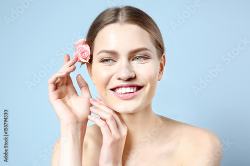 Beautiful young woman with ...