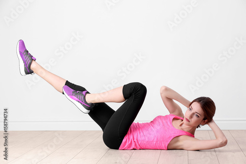 Beautiful woman doing bicyc...