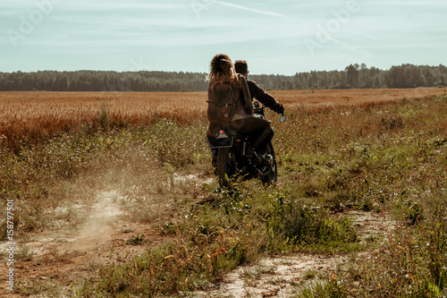 Couple and cafe racer motorcycle