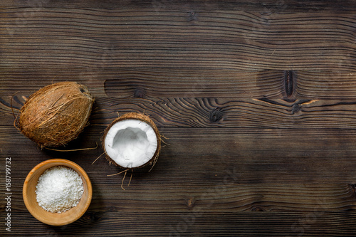 grated coconut for exotic food on wooden table background top view mock-up