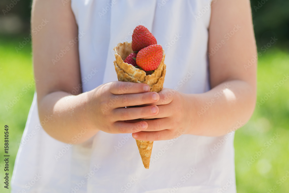 Waffle cone filled with strawberries Waffle cone filled with strawberries