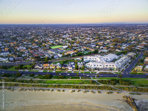 Aerial view of beach road and suburban houses in Melbourne photo