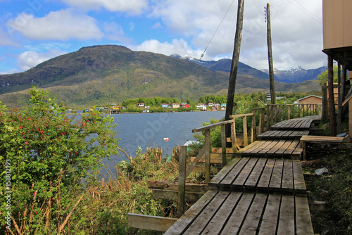 Boardwalk at the isolated Puerto Eden in Wellington Islands, fiords of southern Chile, Province Ultima Esparanza photo