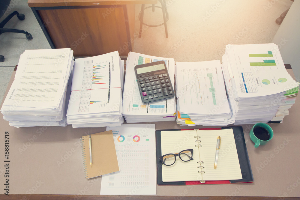 Pile of unfinished documents on office desk, Stack of business paper, Vintage Effect Pile of unfinished documents on office desk, Stack of business paper, Vintage Effect