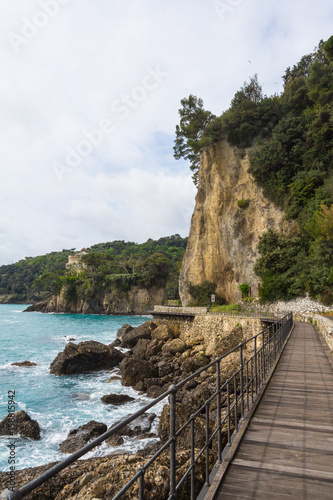 Rocks and the sea near Santa Margherita Ligure, Italy. A picturesque promenade, rocks and the sea