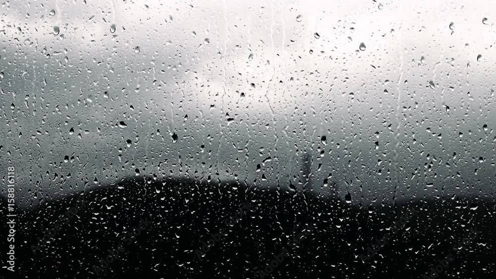 Rain drops on a glass surface Rain drops on a glass surface