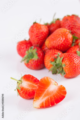 Strawberries berry close up on white background