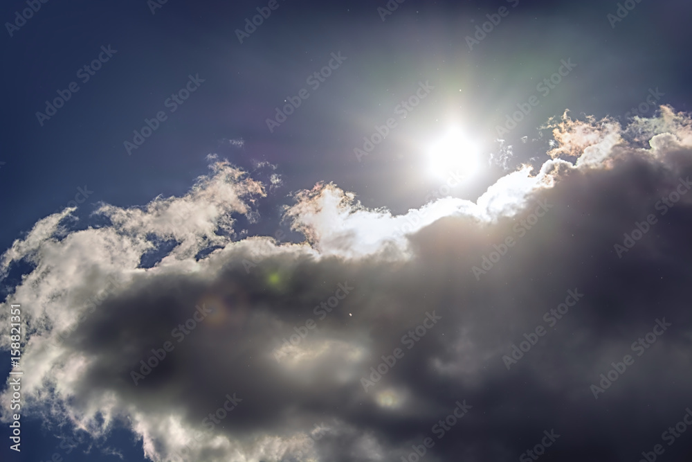 the sun's rays through cloudy sky the sun's rays through cloudy sky