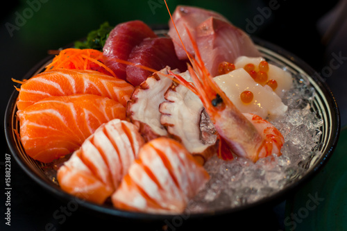 Sashimi is a Japanese delicacy consisting of very fresh raw meat or fish sliced into thin pieces