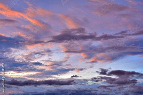 Fototapeta Naklejka Na Ścianę i Meble -  Colorful clouds on blue sky background with sunrise.