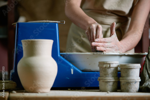 Pottery artist making pots