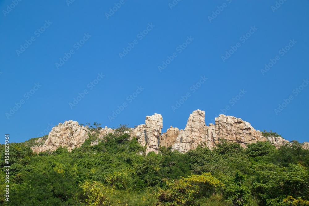 Tall sharp cliff of Khao Sam Muk mountains, in Chonburi, Thailand