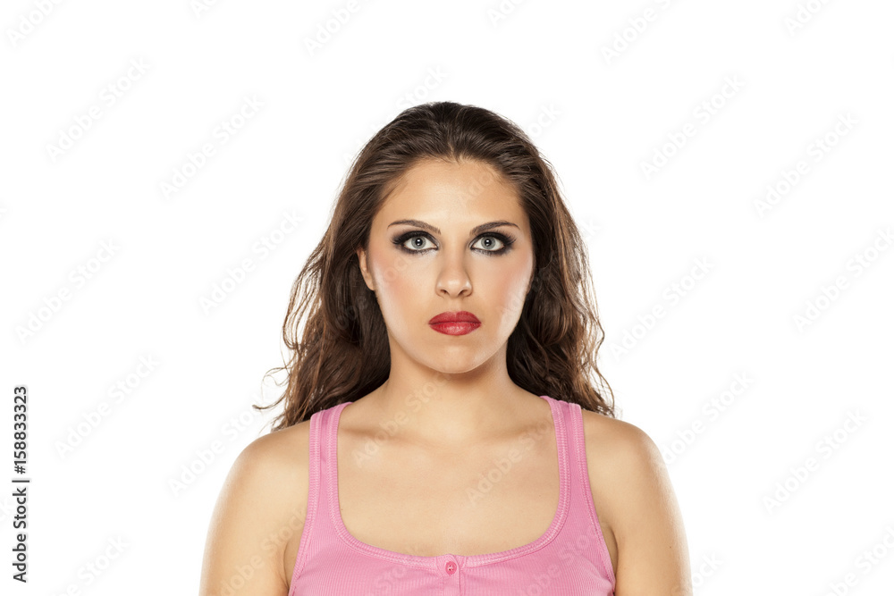 Portrait of a young beautiful woman with blue eyes on white background Portrait of a young beautiful woman with blue eyes on white background