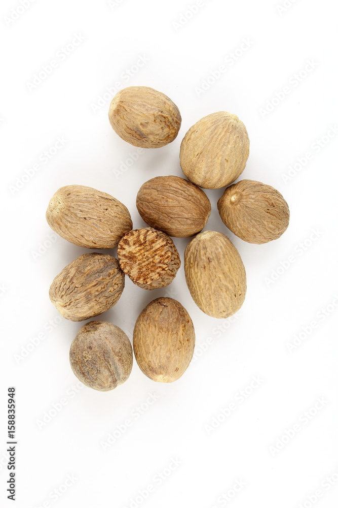 nutmeg seeds isolated on a white background nutmeg seeds isolated on a white background