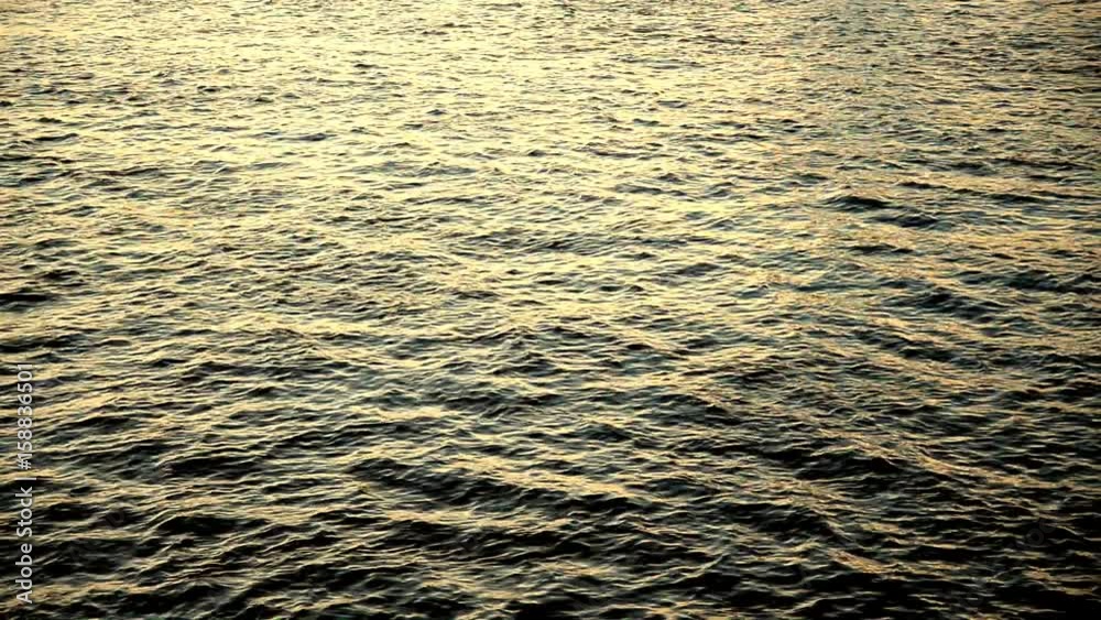 Water with waves by day, may be used as background. Water with waves by day, may be used as background.