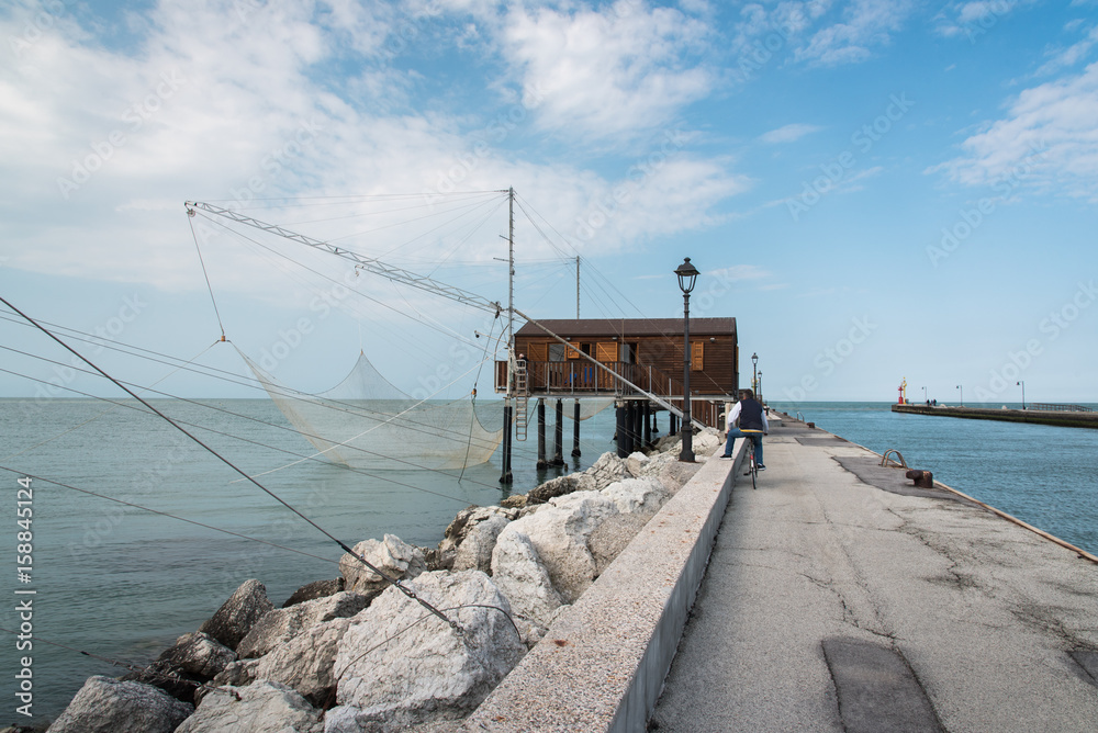 Fishing huts in the canal harbor of Cesenatico. Romagna coast
