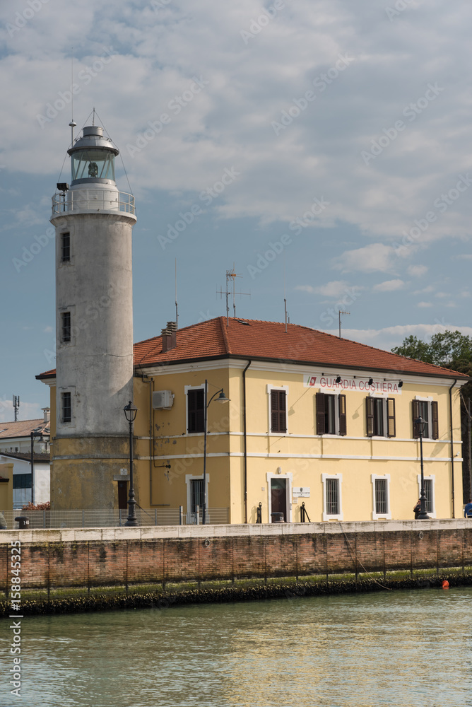Lighthouse in the canal harbor of Cesenatico. Romagna coast