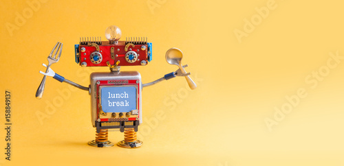 Lunch break concept. Funny robotic toy fork spoon in arms. Retro style cyborg monitor screen with text quote. Yellow background, copy space